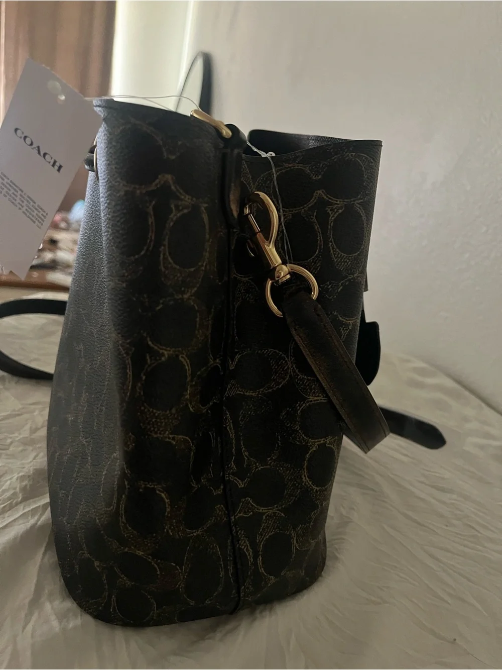 Rowan Bucket Bag in Loved Signature Coated Canvas